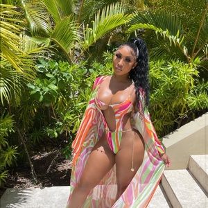 One piece bathing suit with cover up